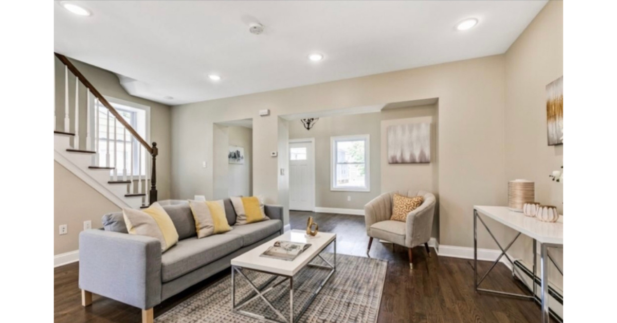 Renovated living room at 850 Gibbons Ct in Elizabeth NJ after restoration by Helios Buys NJ